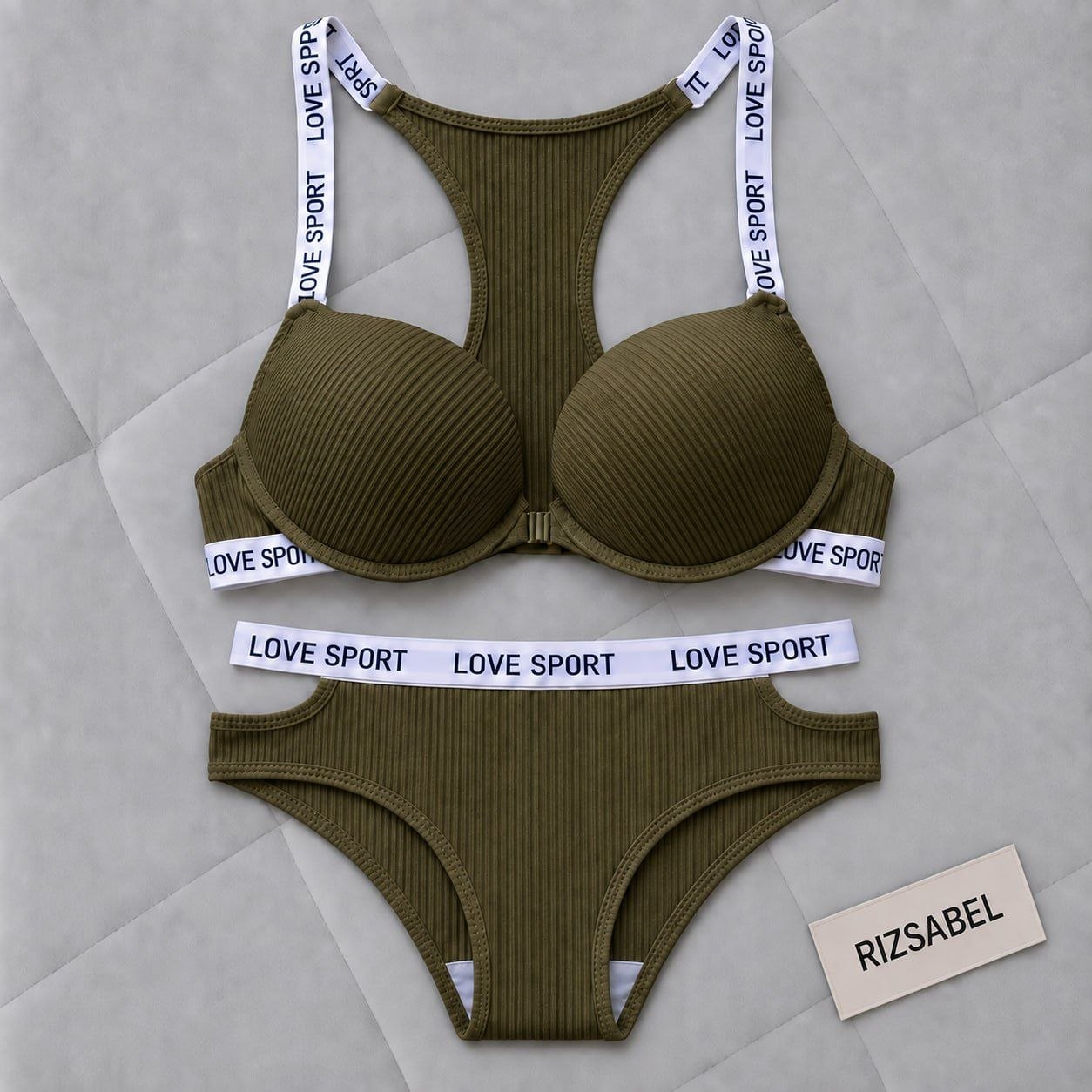 ست شورت و سوتین جلو بازشو جکدار Love sport یشمی